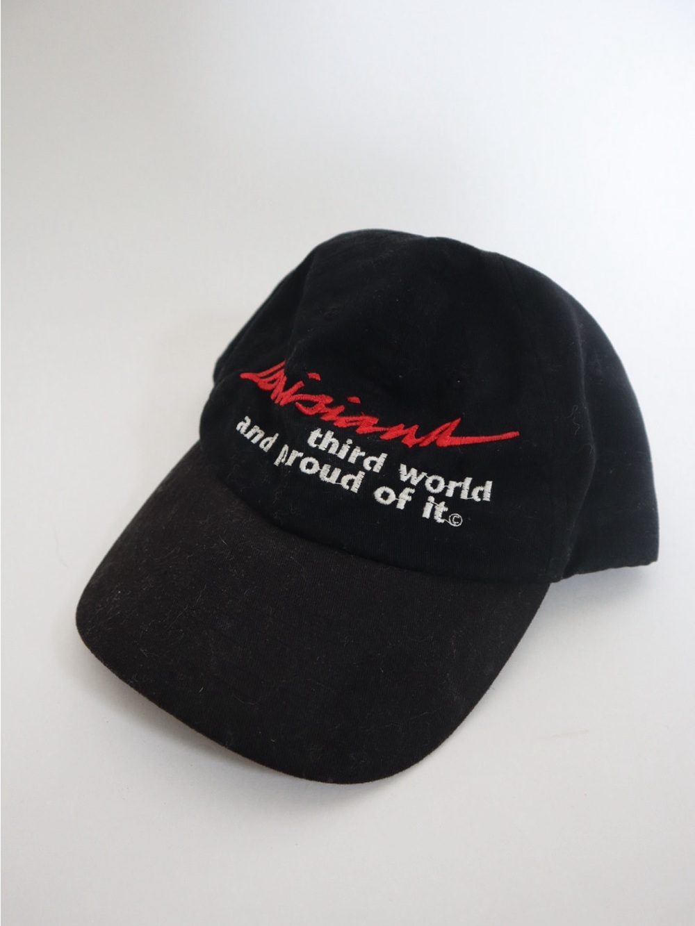 Louisiana Black Baseball Cap with Red Script and White Text